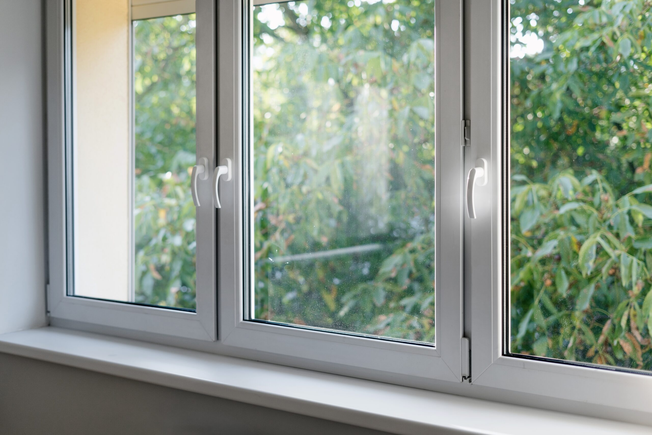 White,Window,Frame,With,Modern,Aluminium,Profiles,In,Bedroom.,Natural